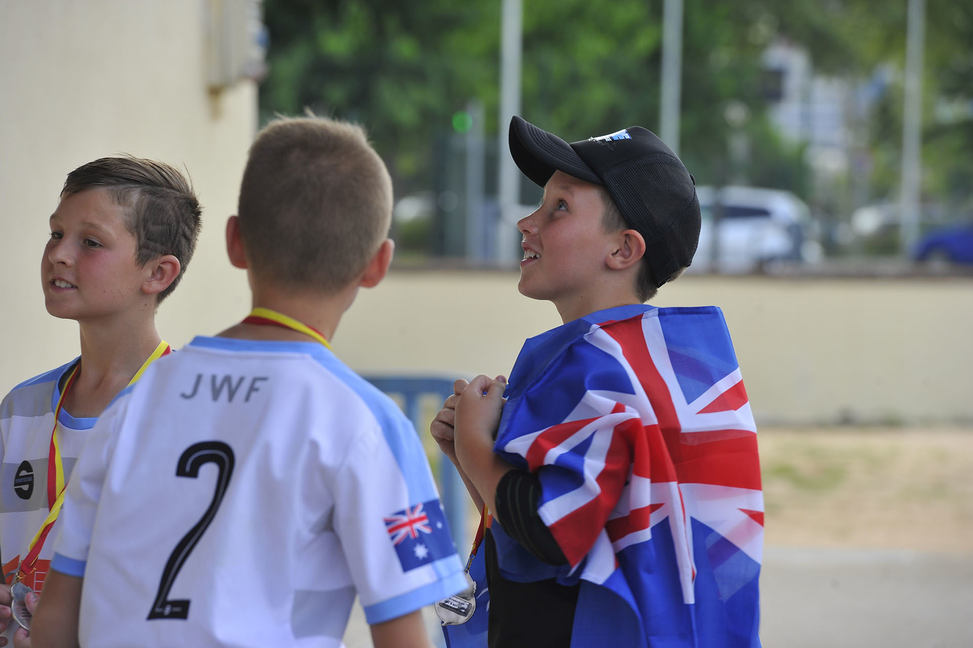 IberCup Barcelona - boy with the English flag - Road to Sport